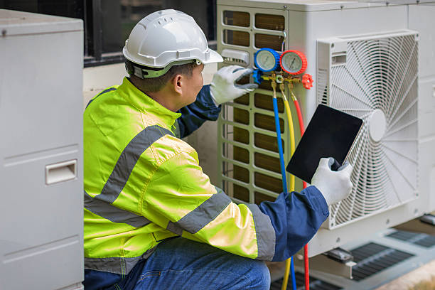 Professional Air Duct Cleaning technician working in Colonia, NJ